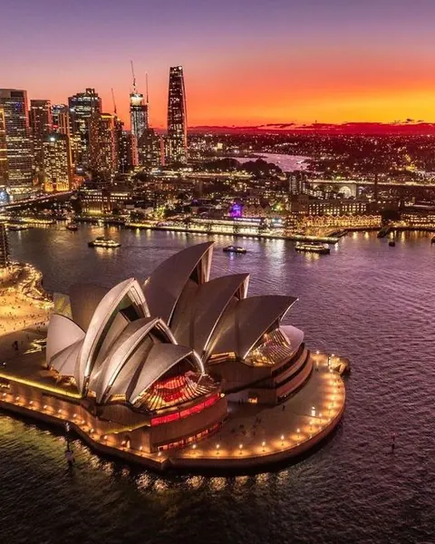 Sydney Opera House and harbour at sunset